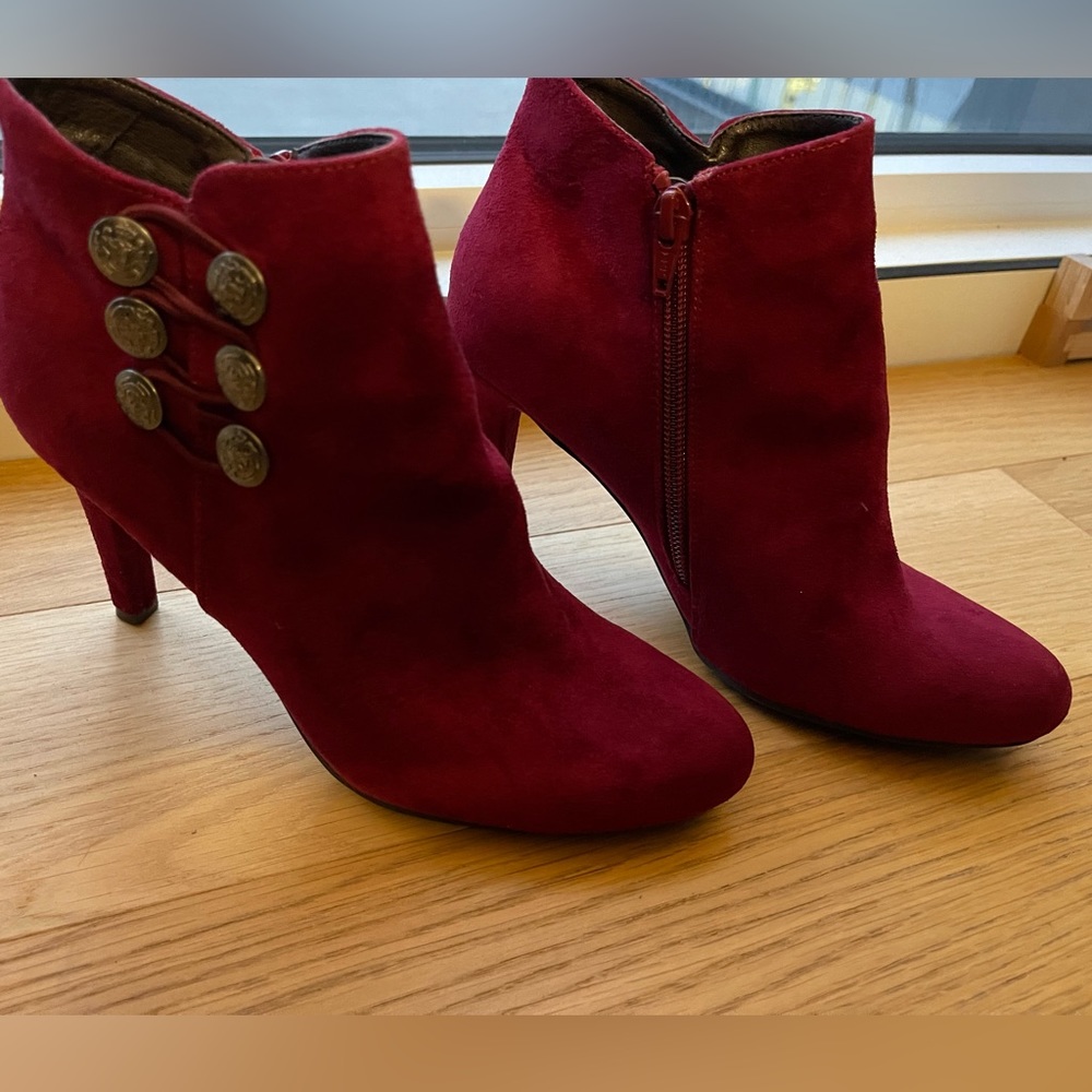 Rialto deep maroon closed toe suede heeled ankle boots.